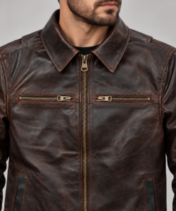Close-up of chest zipper pockets on Torvane distressed brown men's jacket
